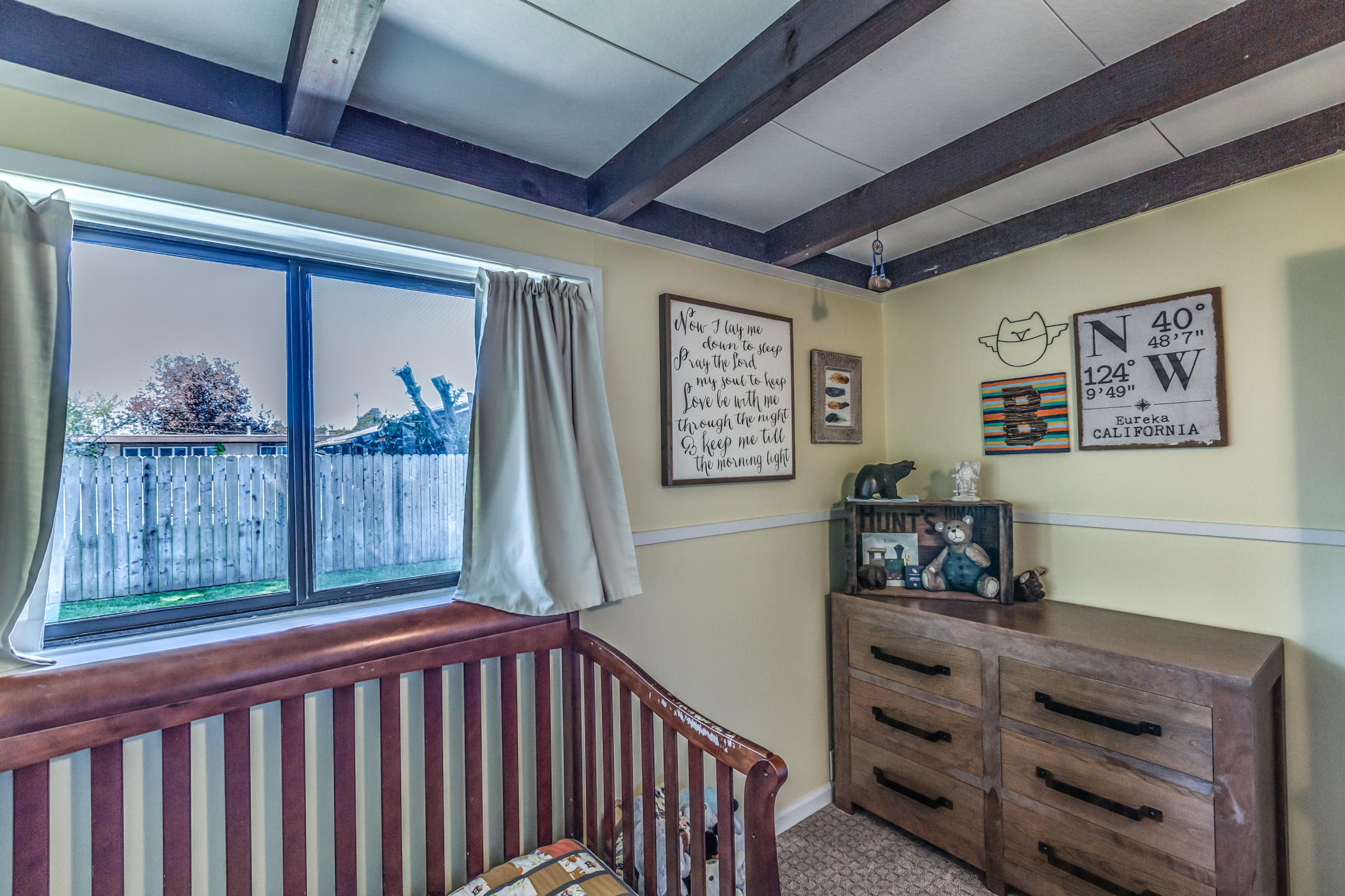 3372 Edgewood Road Myrtletown, CA 95501 - Photo 27 of 44 a bedroom with furniture and wooden floor