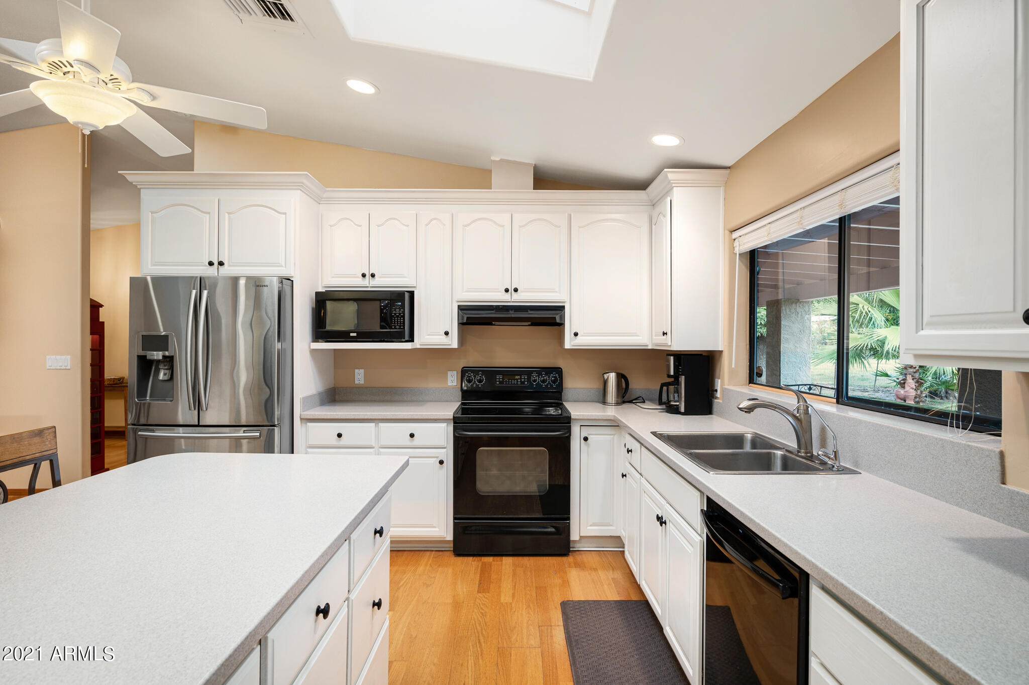 1735 North Rico Circle Mesa, AZ 85213 - Photo 12 of 48 White Cabinets & Skylights