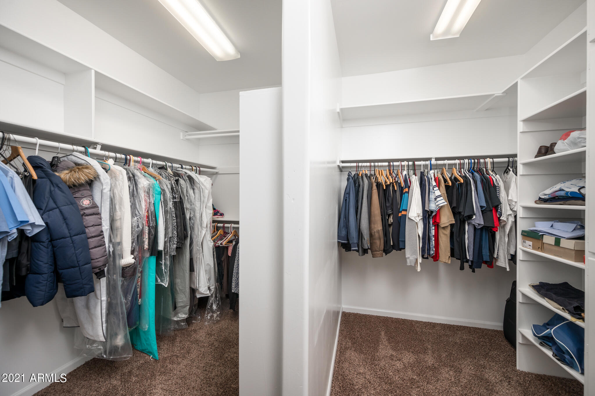 1735 North Rico Circle Mesa, AZ 85213 - Photo 23 of 48 His & Hers Walk-In Closet w/ Built-Ins