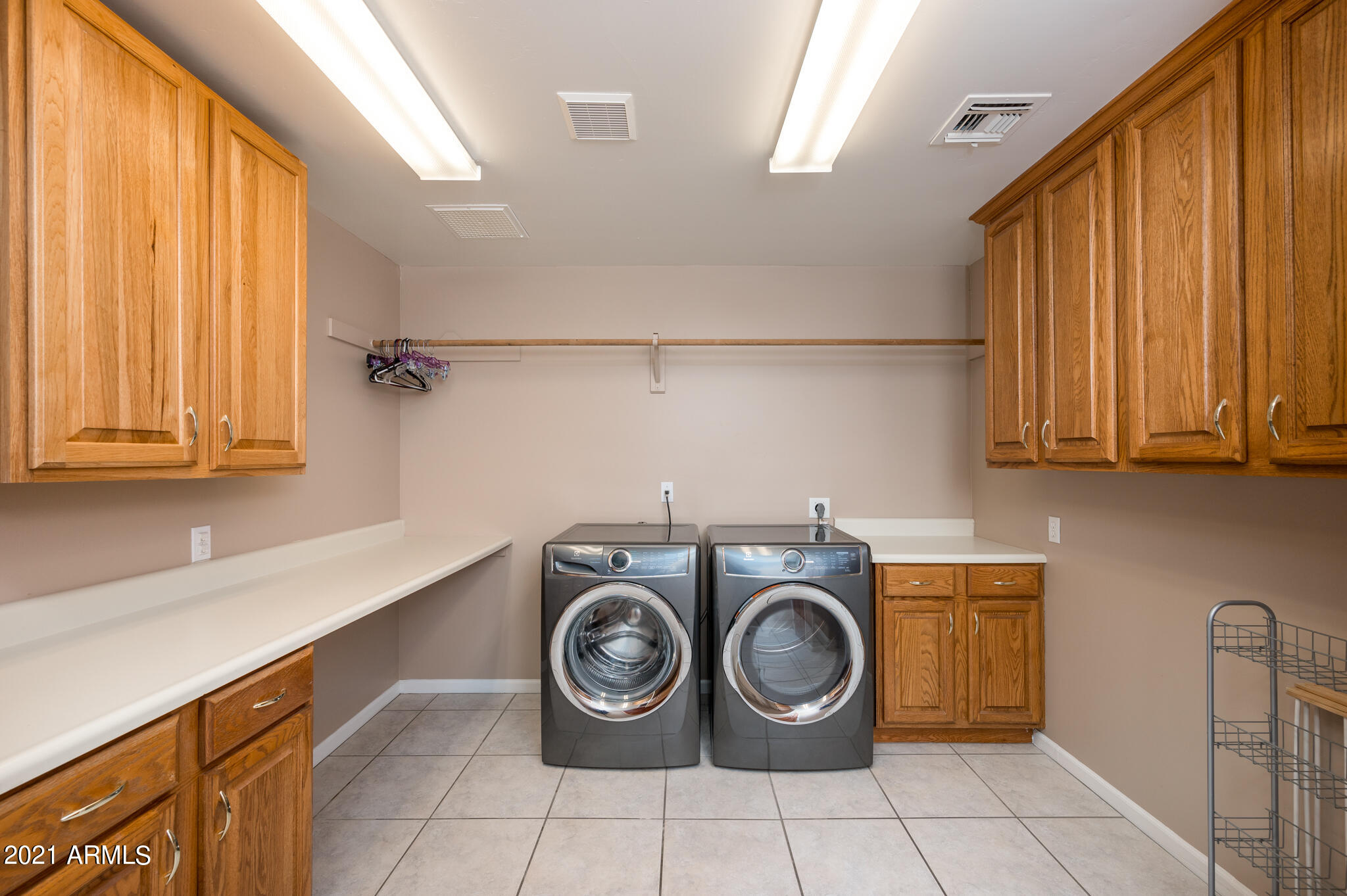 1735 North Rico Circle Mesa, AZ 85213 - Photo 34 of 48 Laundry Room w/ Storage & Counterspace