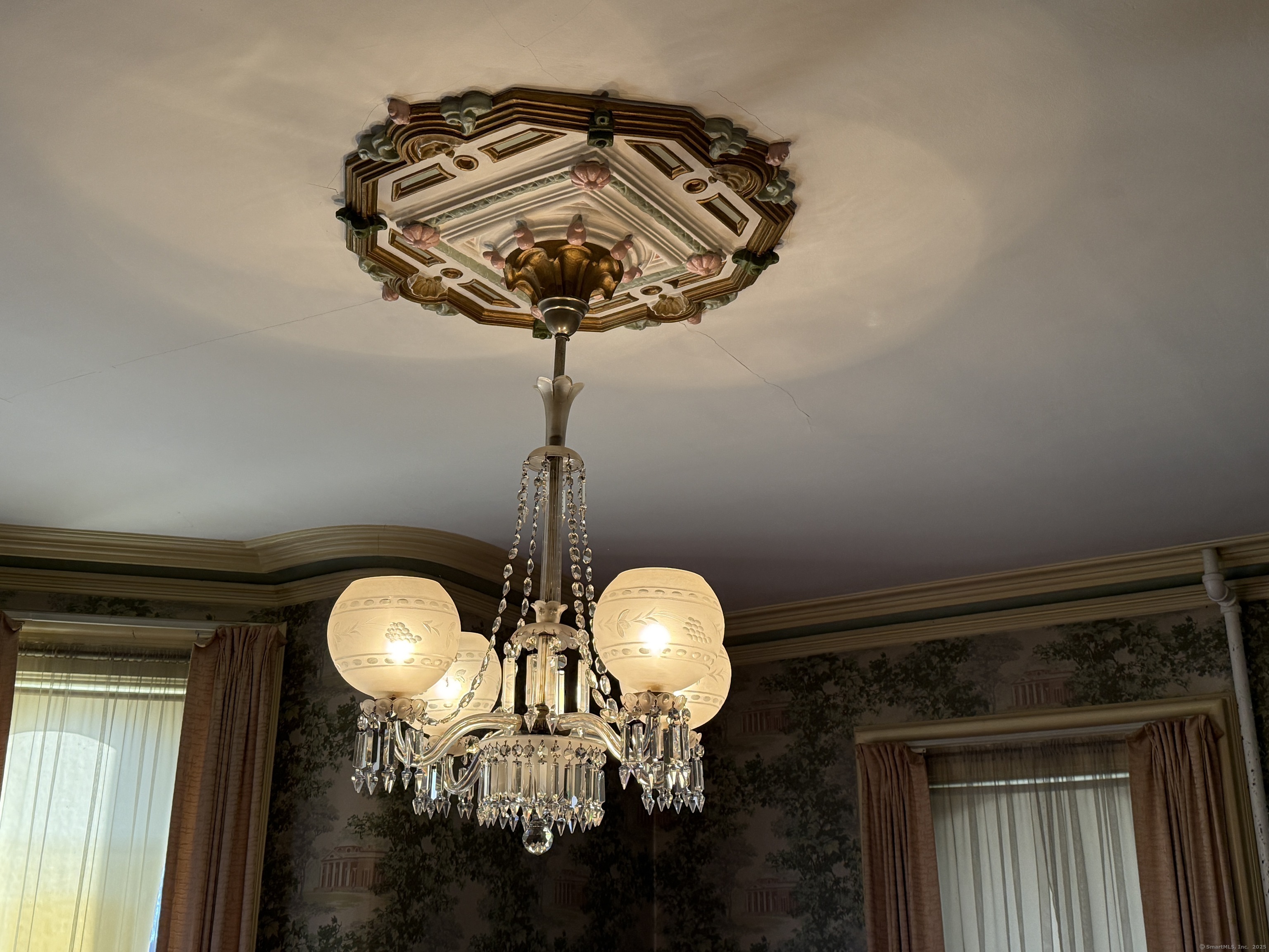 55 Walnut Street Winchester, CT 06098 - Photo 16 of 37 a close view of a chandelier in hallway