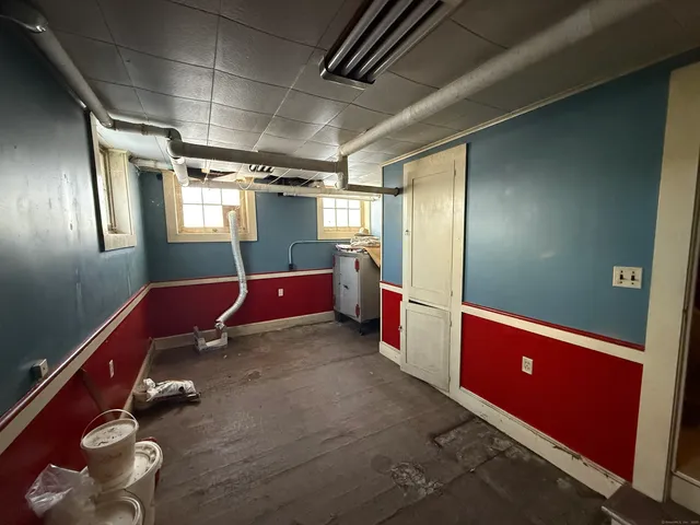 a view of entryway with wooden floor