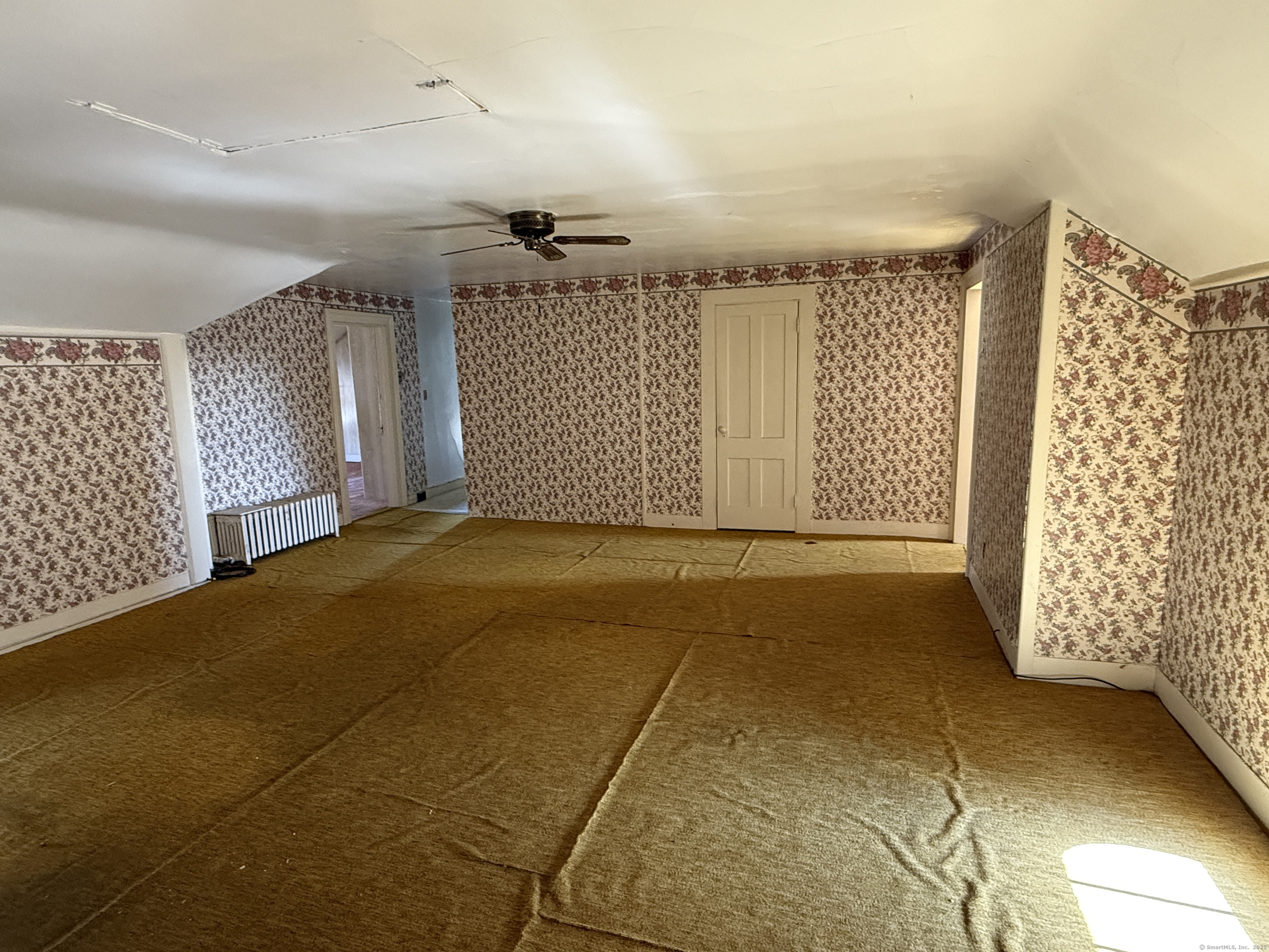 55 Walnut Street Winchester, CT 06098 - Photo 26 of 37 an empty room with windows