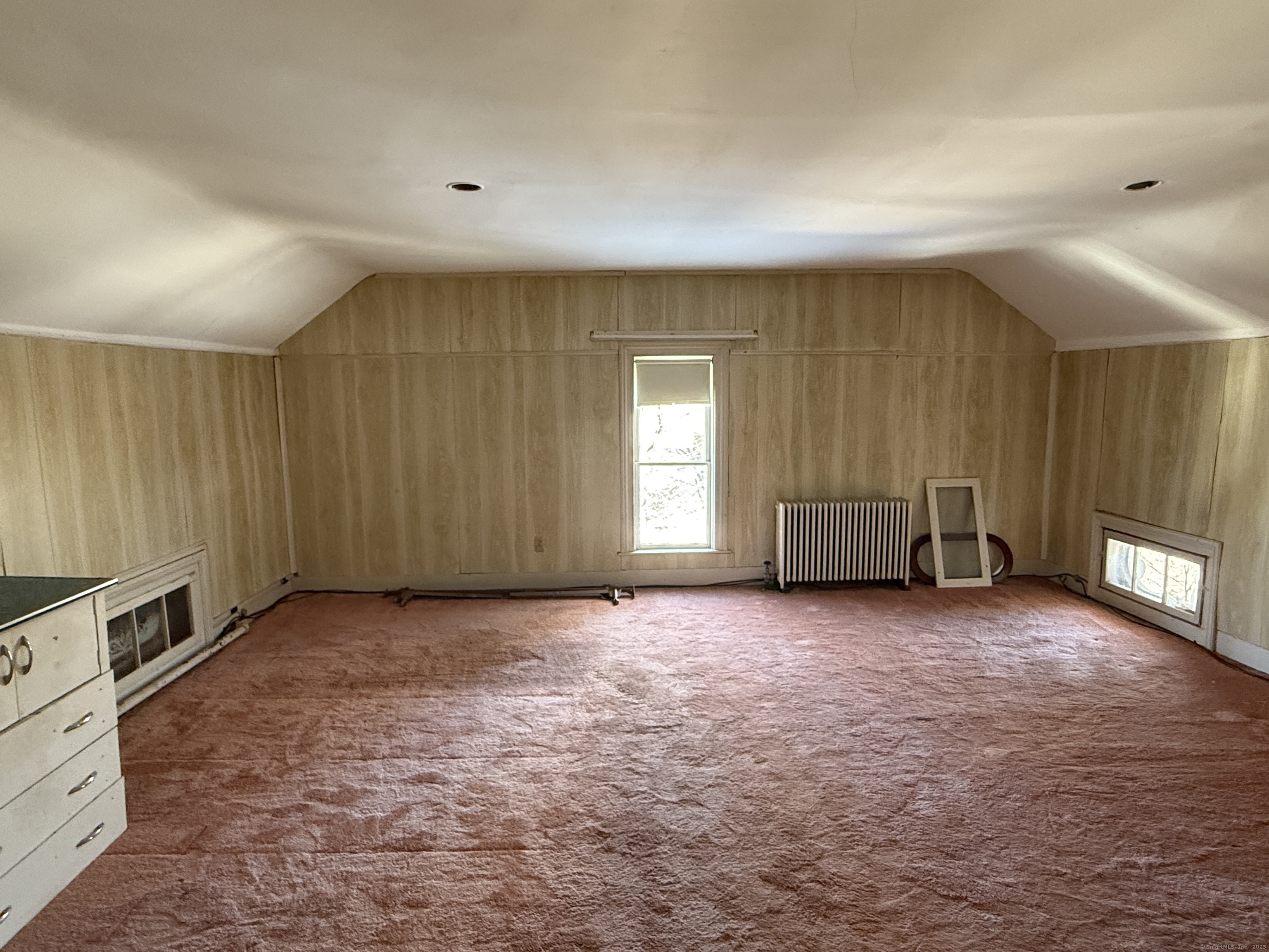 55 Walnut Street Winchester, CT 06098 - Photo 28 of 37 a view of an empty room with a fireplace