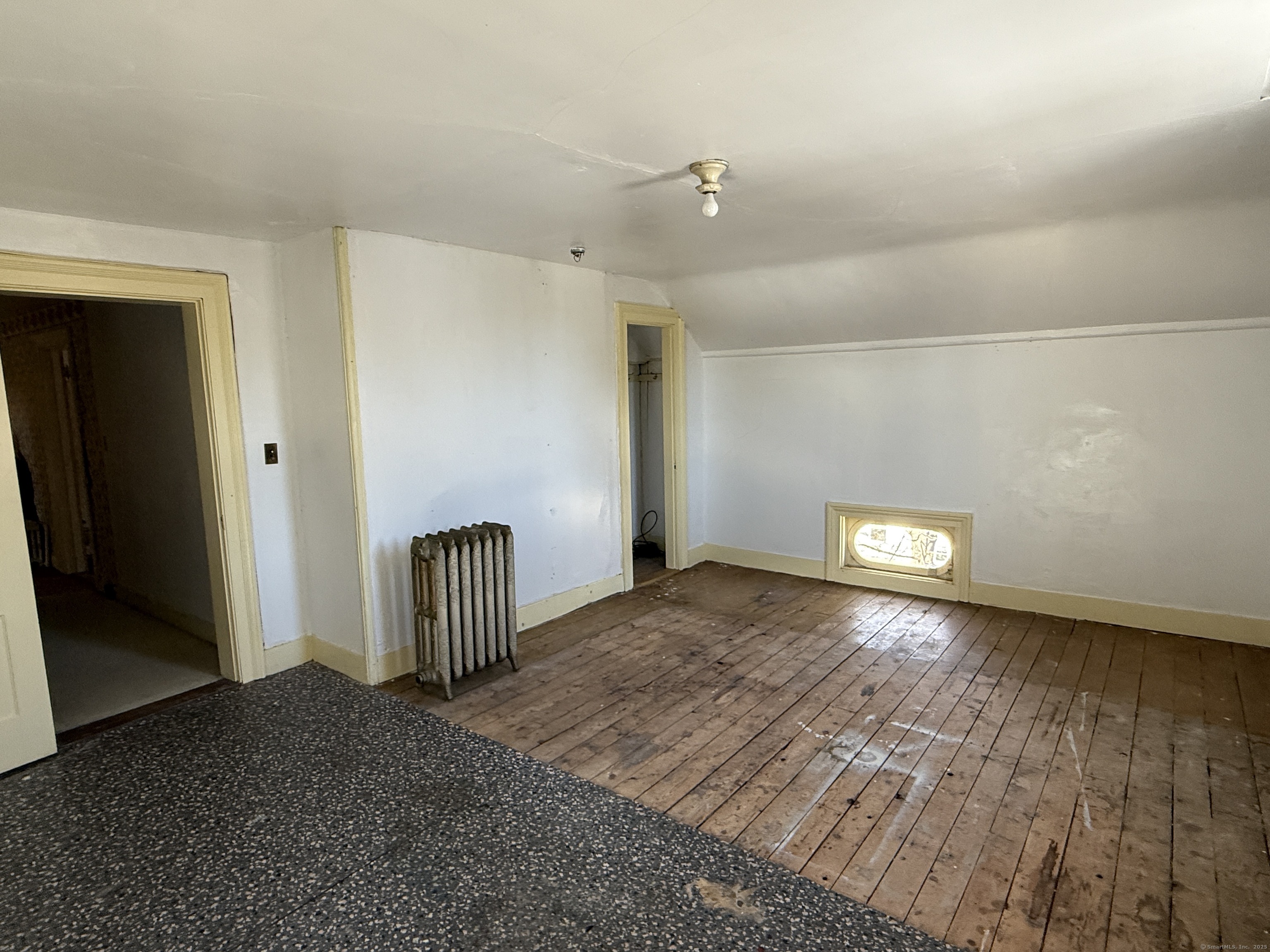 55 Walnut Street Winchester, CT 06098 - Photo 29 of 37 a view of a livingroom with wooden floor
