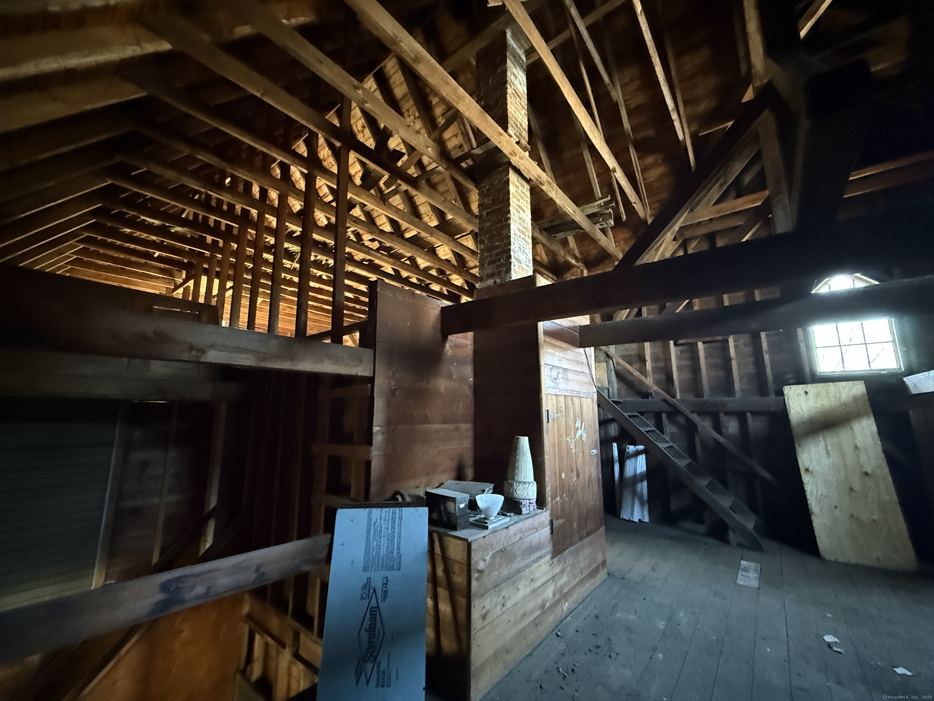55 Walnut Street Winchester, CT 06098 - Photo 33 of 37 a view of an empty room with wooden floor