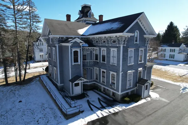 a view of a house with a porch
