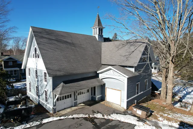 a view of roof with sitting area