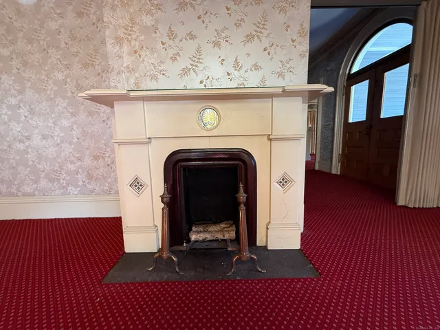 a view of washer and dryer with wooden floor
