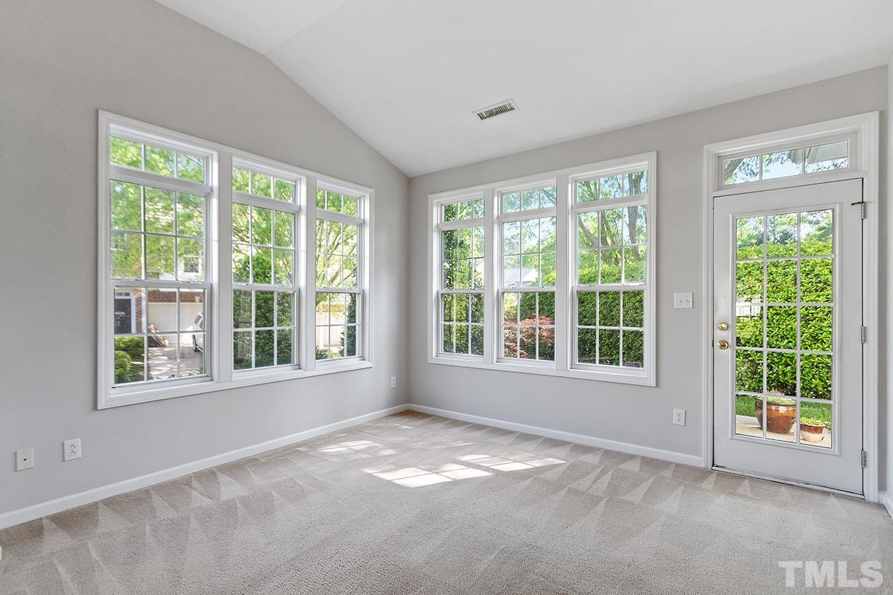 1401 Basinger Court Raleigh, NC 27612 - Photo 8 of 32 a view of an empty room with a window