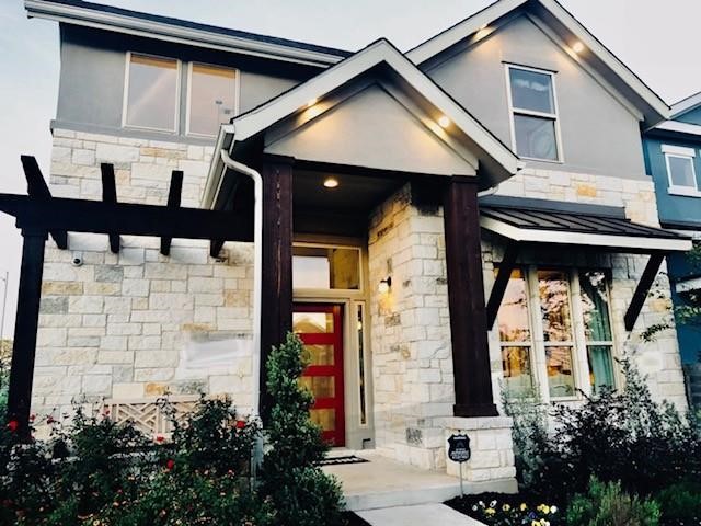 6000 Baythorne Drive Austin, TX 78747 - Photo 1 of 1 a front view of a house with a yard