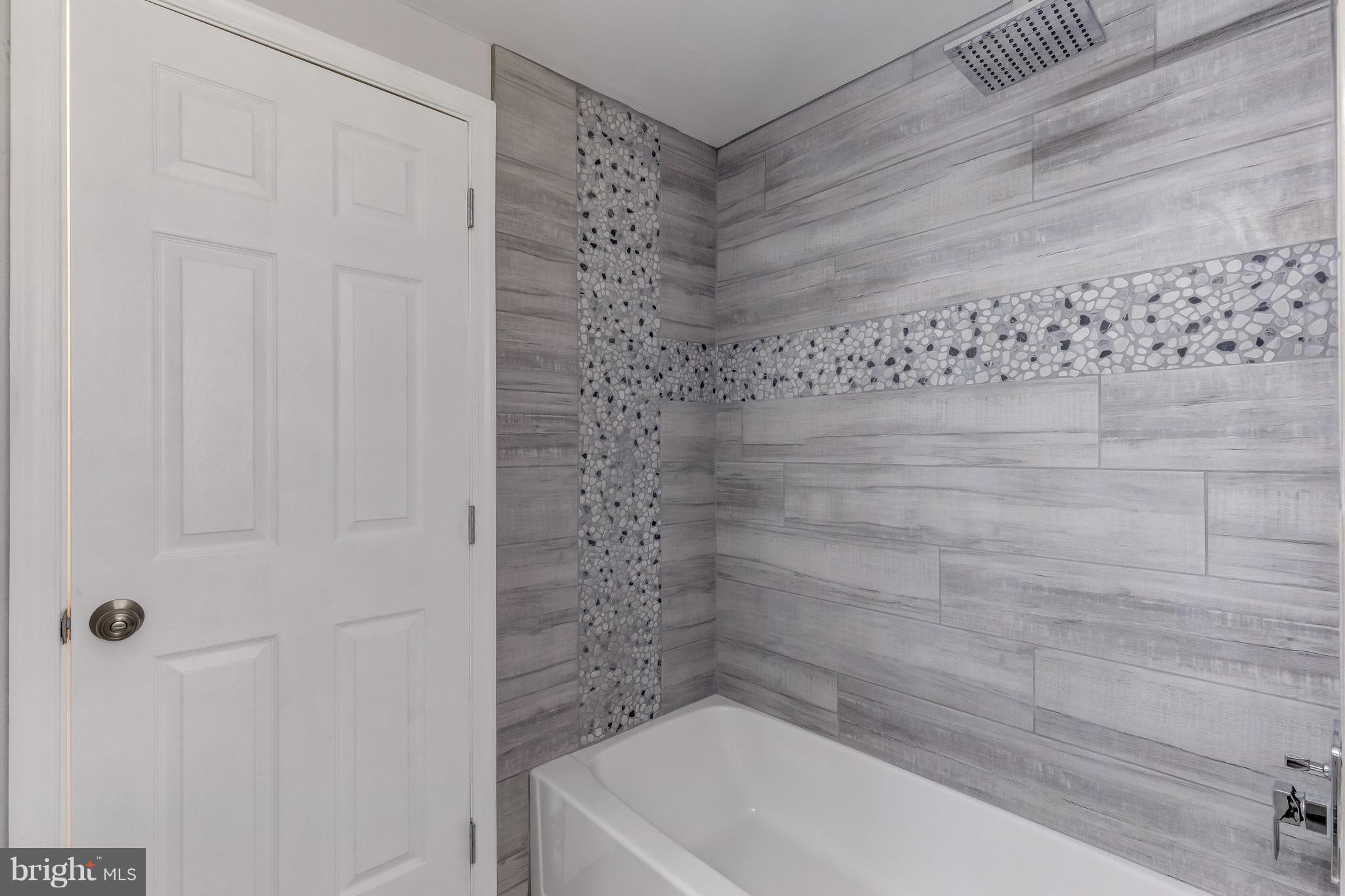 9900 Hidden Valley Road Perry Hall, MD 21128 - Photo 16 of 29 Main Level Hall Bath