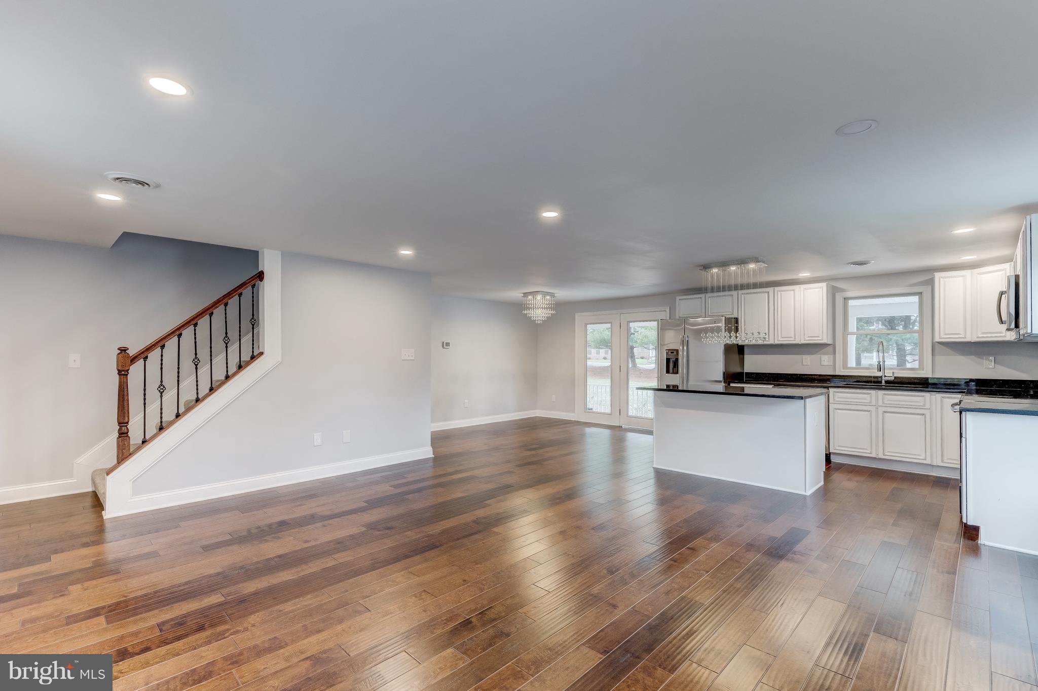 9900 Hidden Valley Road Perry Hall, MD 21128 - Photo 5 of 29 Living Room Open to Dining Room & Kitchen
