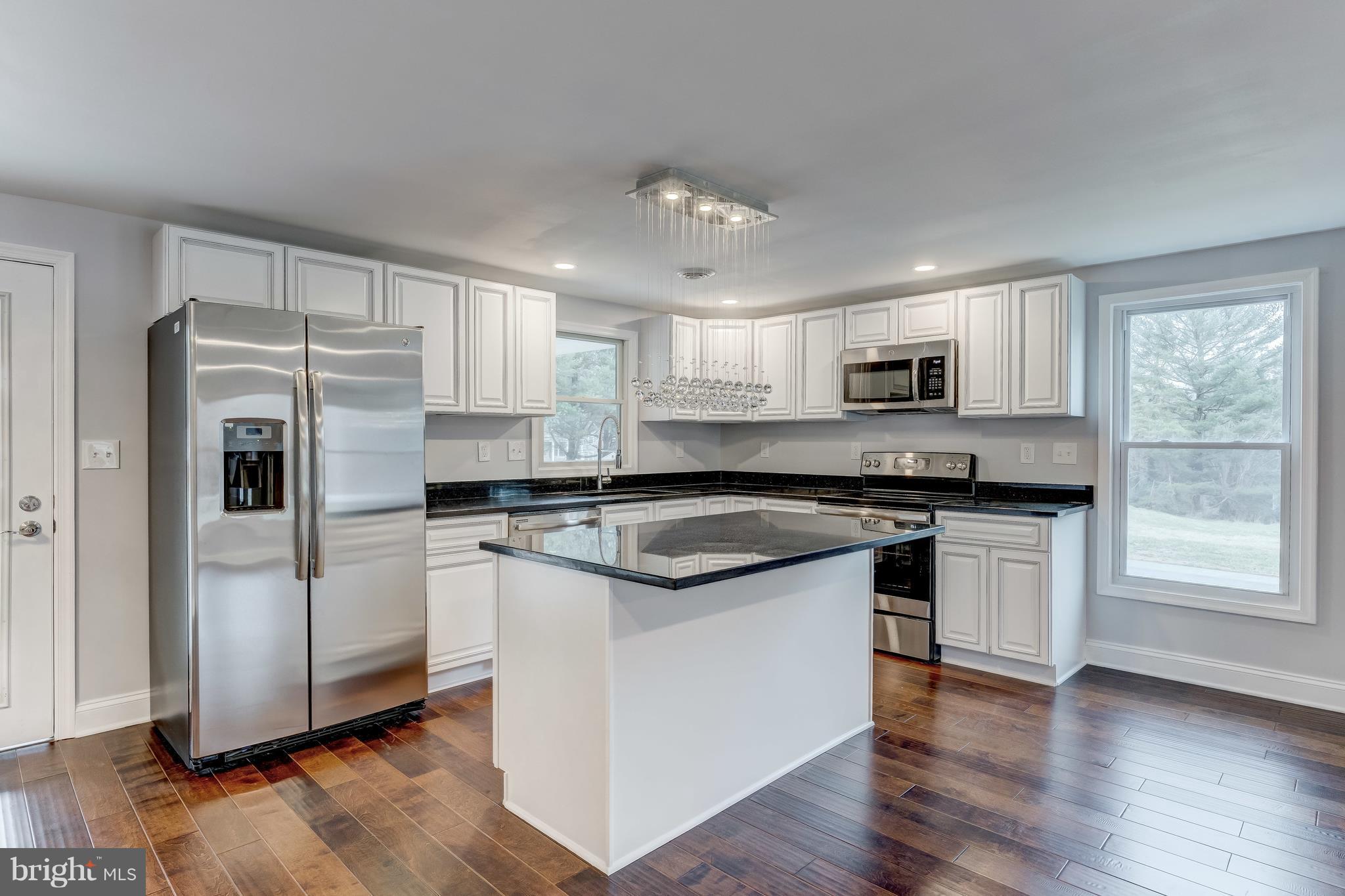 9900 Hidden Valley Road Perry Hall, MD 21128 - Photo 9 of 29 Kitchen With GE Stainless Appliances & Granite