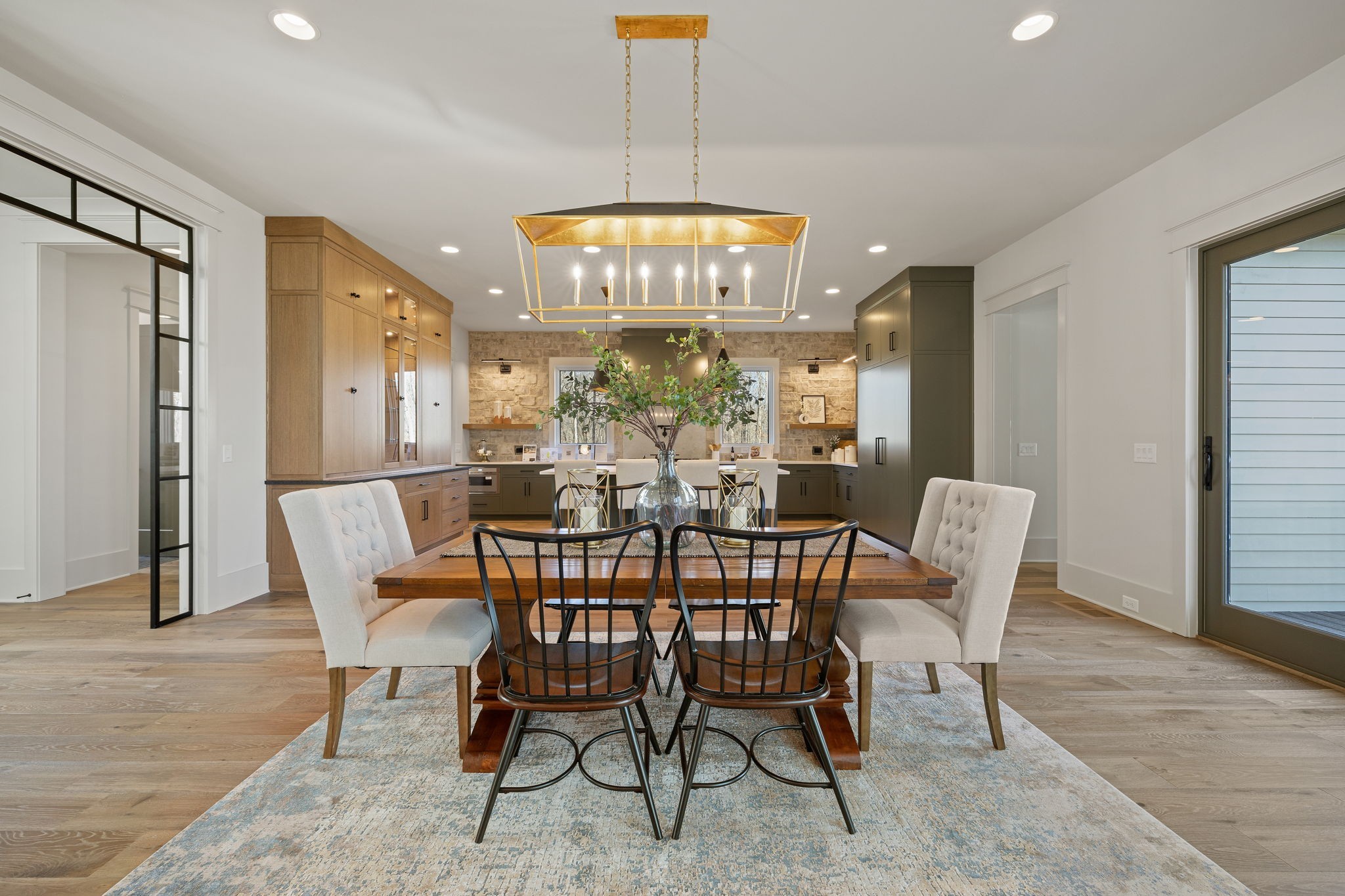 5896 Pinewood Road Franklin, TN 37064 - Photo 14 of 66 a view of a dining room with furniture window and wooden floor