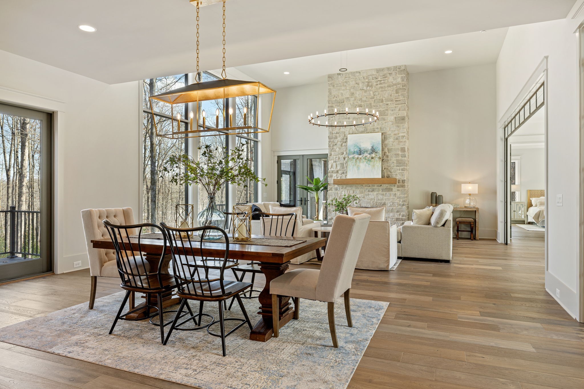 5896 Pinewood Road Franklin, TN 37064 - Photo 16 of 66 a view of a dining room with furniture window and wooden floor