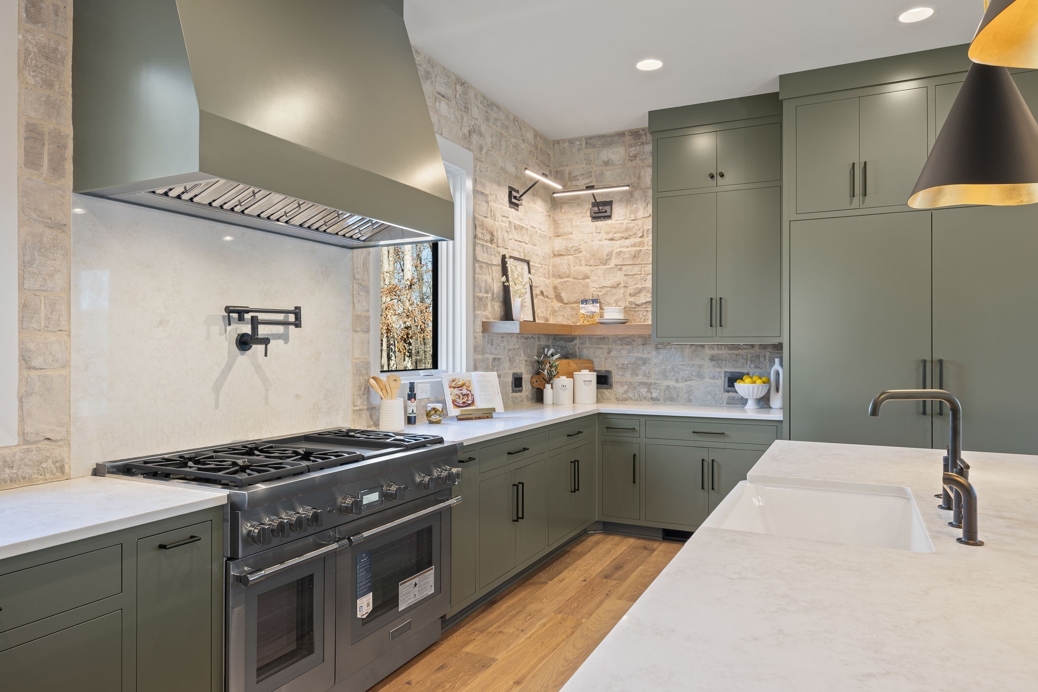 5896 Pinewood Road Franklin, TN 37064 - Photo 25 of 66 a kitchen with a sink stove and cabinets