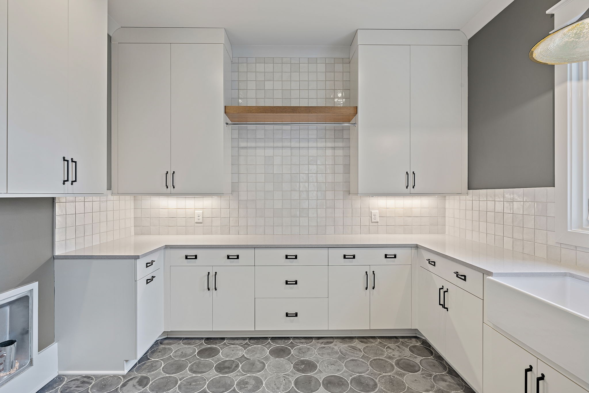 5896 Pinewood Road Franklin, TN 37064 - Photo 28 of 66 a kitchen with granite countertop white cabinets and white appliances