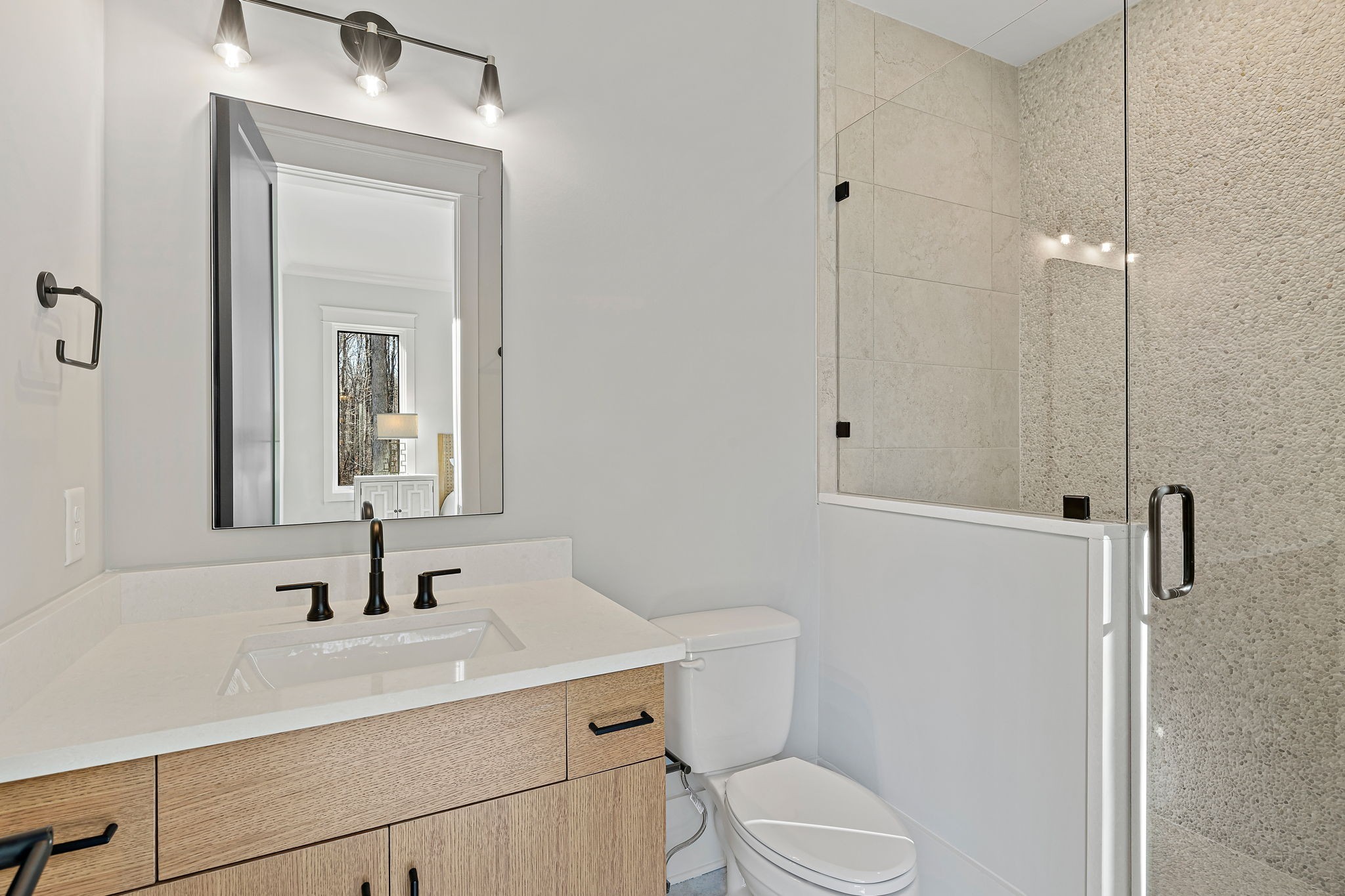 5896 Pinewood Road Franklin, TN 37064 - Photo 33 of 66 a bathroom with a sink a toilet and shower