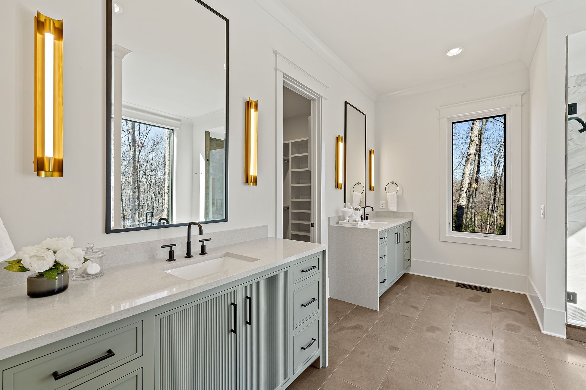 5896 Pinewood Road Franklin, TN 37064 - Photo 37 of 66 a spacious bathroom with a double vanity sink a mirror a and a window