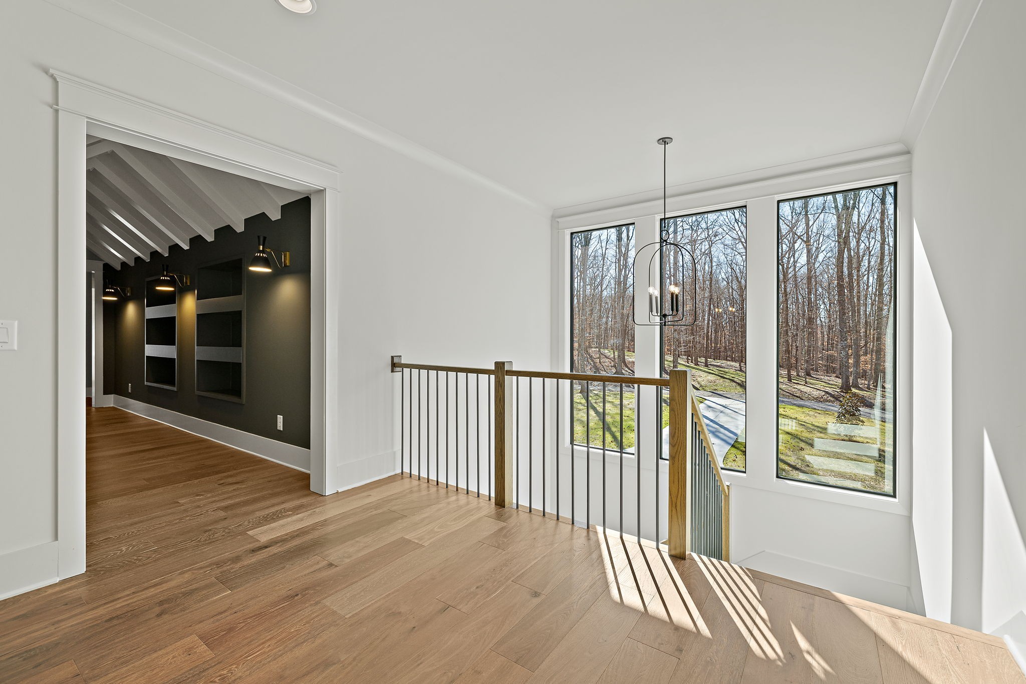 5896 Pinewood Road Franklin, TN 37064 - Photo 44 of 66 a view of a room with wooden floor and windows