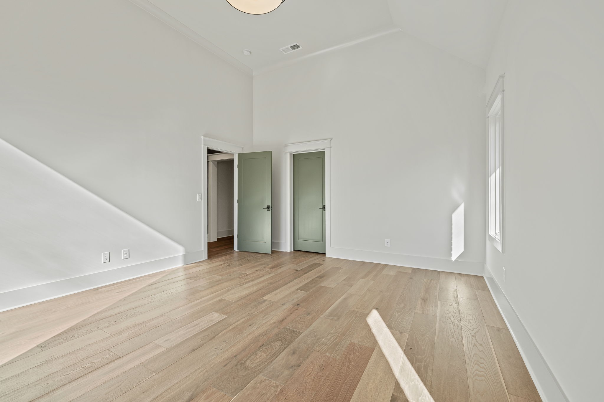 5896 Pinewood Road Franklin, TN 37064 - Photo 52 of 66 a view of an empty room with wooden floor