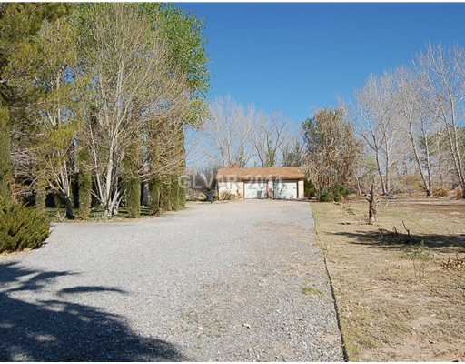 6601 Hafen Ranch Road Pahrump, NV 89061 - Photo 2 of 12 Parking Lot. VIEW OF DRIVEWAY FROM HAFEN RANCH RD TO GARAGE