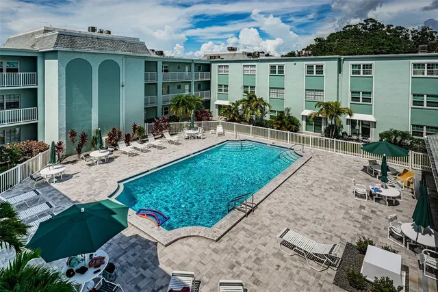 a view of a house with backyard porch and patio