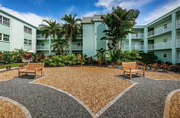 a view of a house with patio outdoor seating area