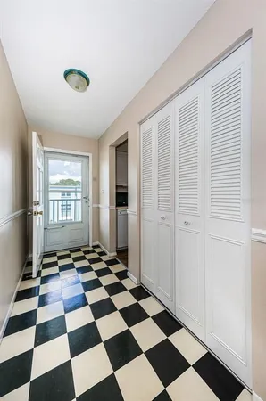 a black and white checkered floor with a black white checkered floor