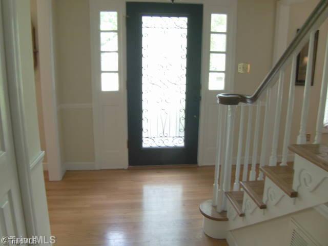 3205 Pine Needles Road High Point, NC 27265 - Photo 3 of 16 Exterior Front. Lovely front door and see the beautiful real hardwood floors!
