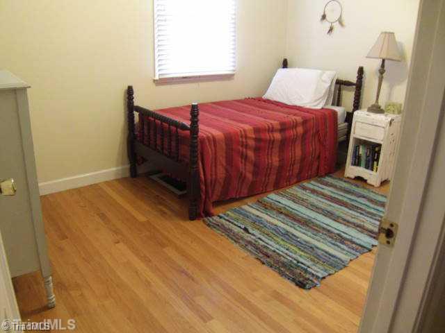3205 Pine Needles Road High Point, NC 27265 - Photo 9 of 16 2nd Bedroom. Bedroom has lovely hardwood floors as well...