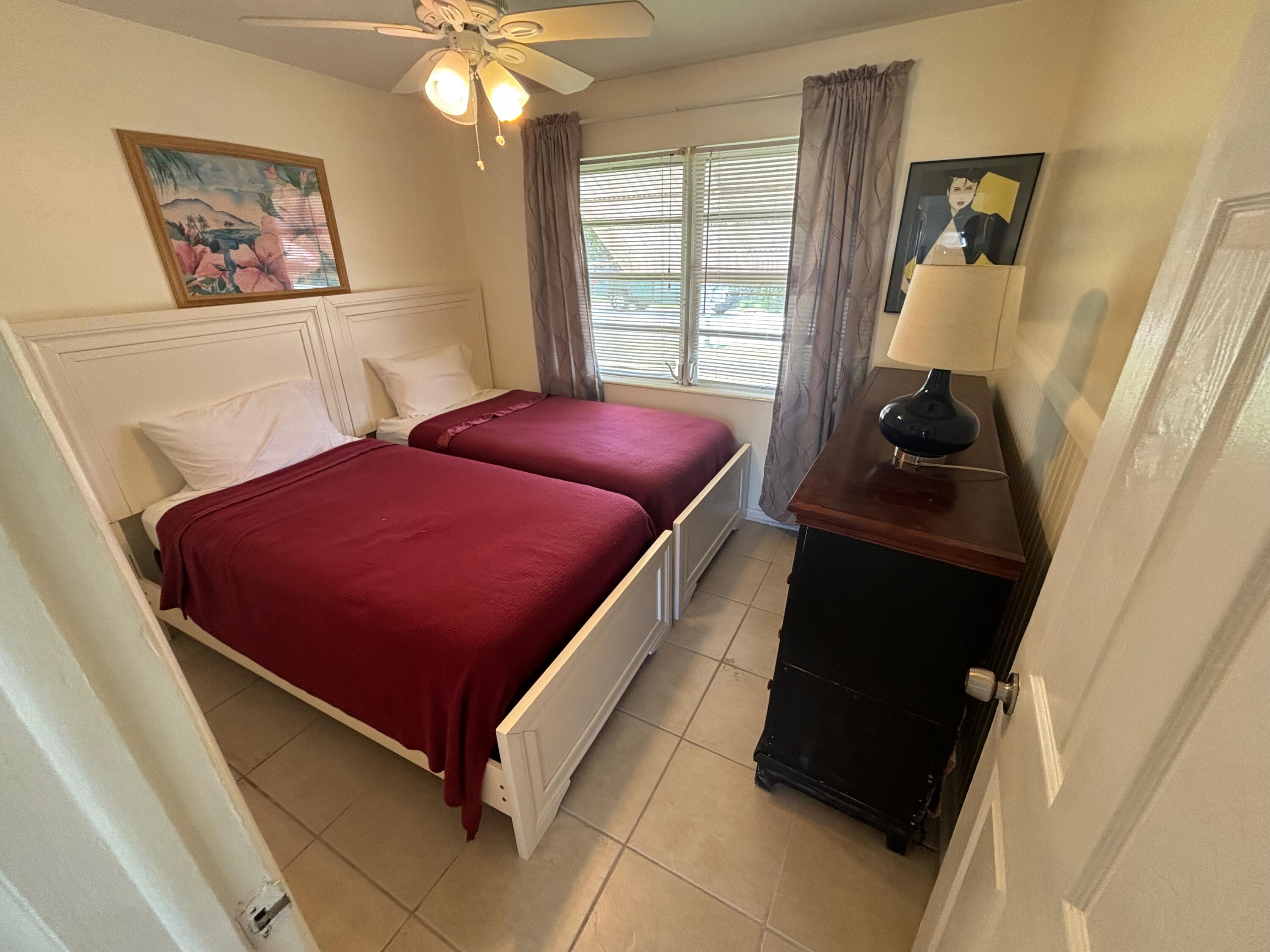1433 Sunset Road Big Pine Key, FL 33043 - Photo 15 of 18 a room with pool table and windows