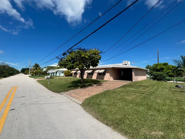 a view of a house with a patio
