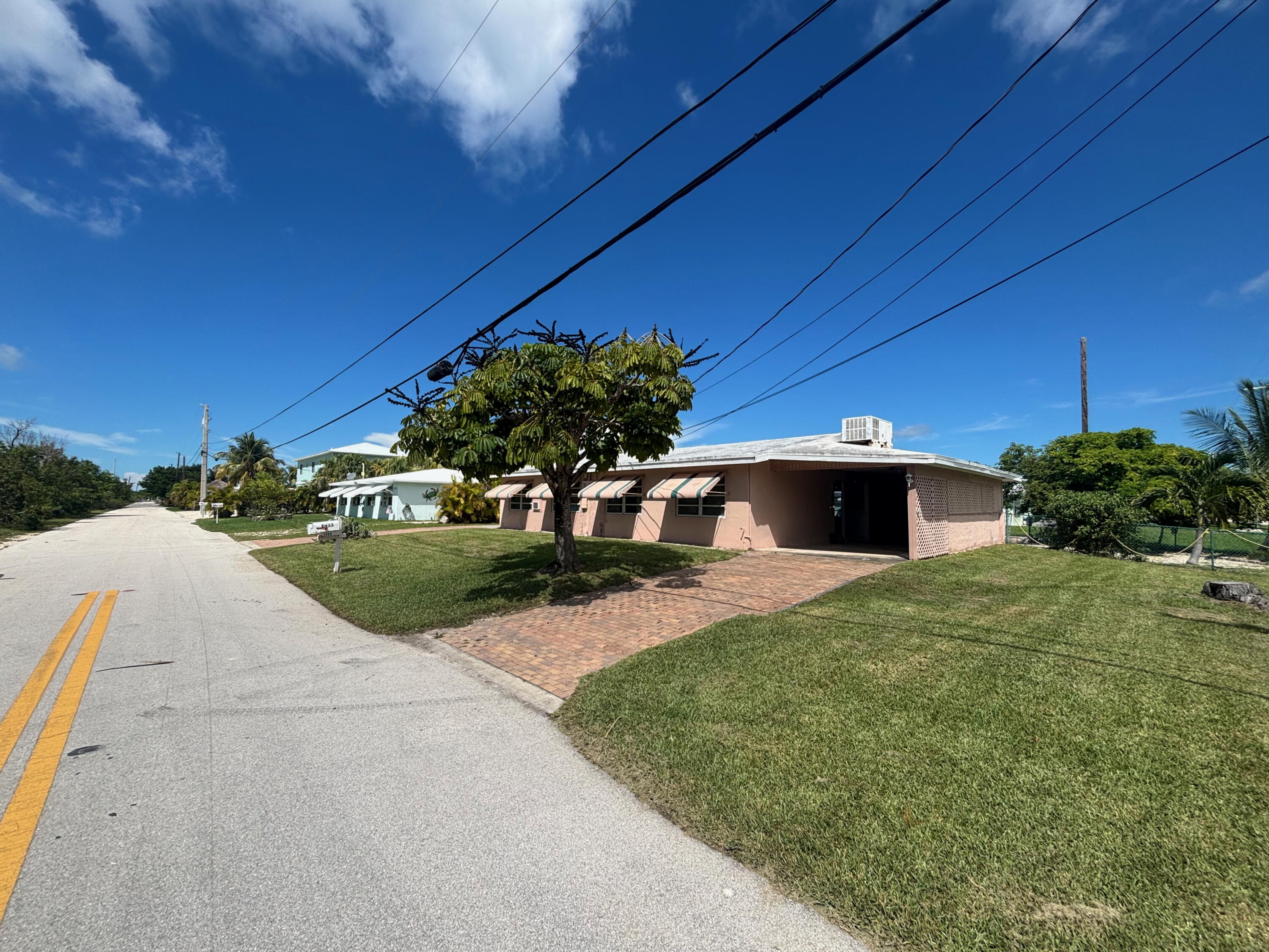 1433 Sunset Road Big Pine Key, FL 33043 - Photo 2 of 18 a view of a house with a patio
