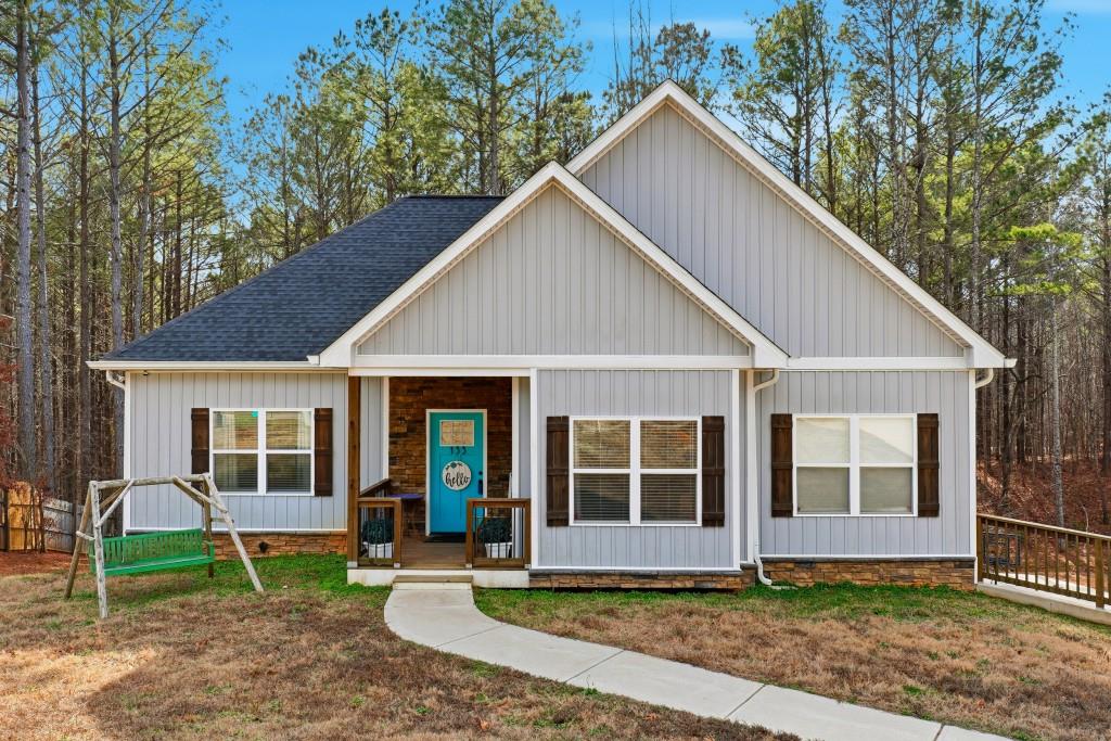 133 Pebblebrook Way Temple, GA 30179 - Photo 1 of 36 a front view of a house with garden