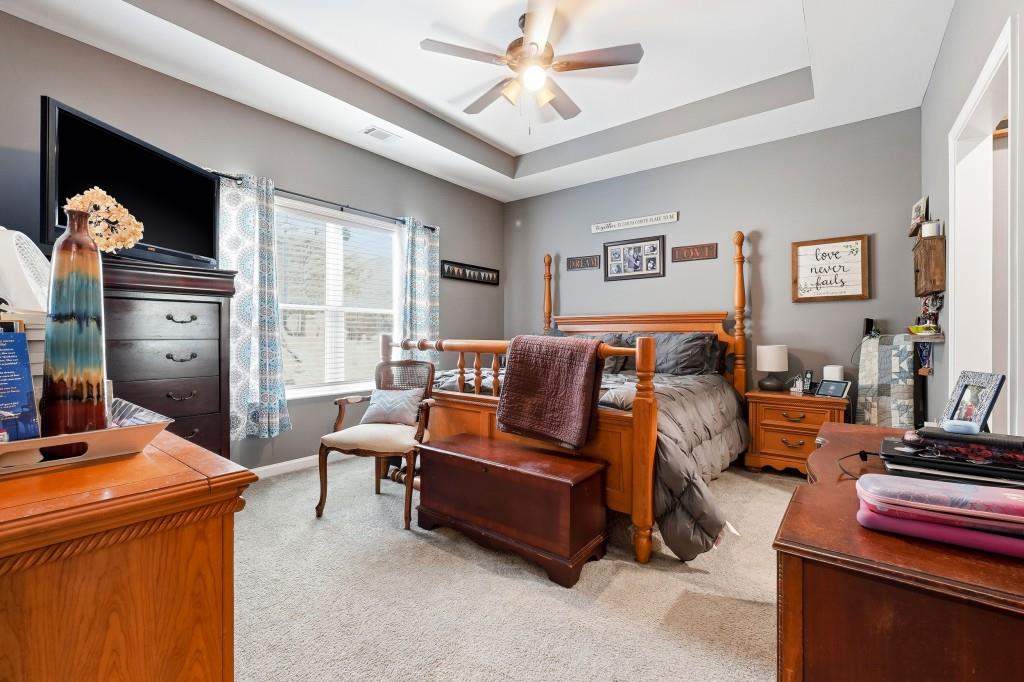 133 Pebblebrook Way Temple, GA 30179 - Photo 14 of 36 a living room with furniture and a flat screen tv