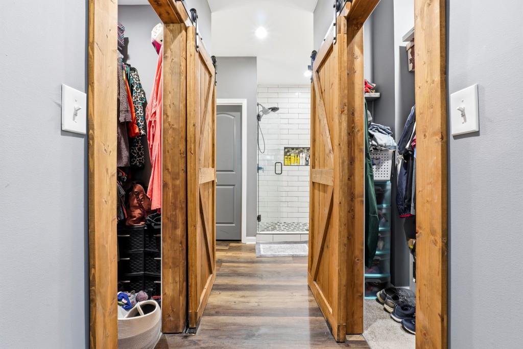 133 Pebblebrook Way Temple, GA 30179 - Photo 16 of 36 a view of walk in closet with clothes and shoes