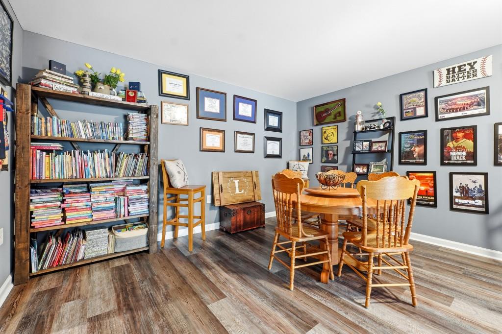 133 Pebblebrook Way Temple, GA 30179 - Photo 24 of 36 a dining room with furniture and wooden floor
