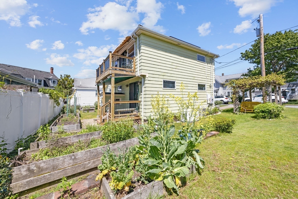 7 Grove Street Wareham, MA 02558 - Photo 33 of 41 a view of a house with a yard and garden