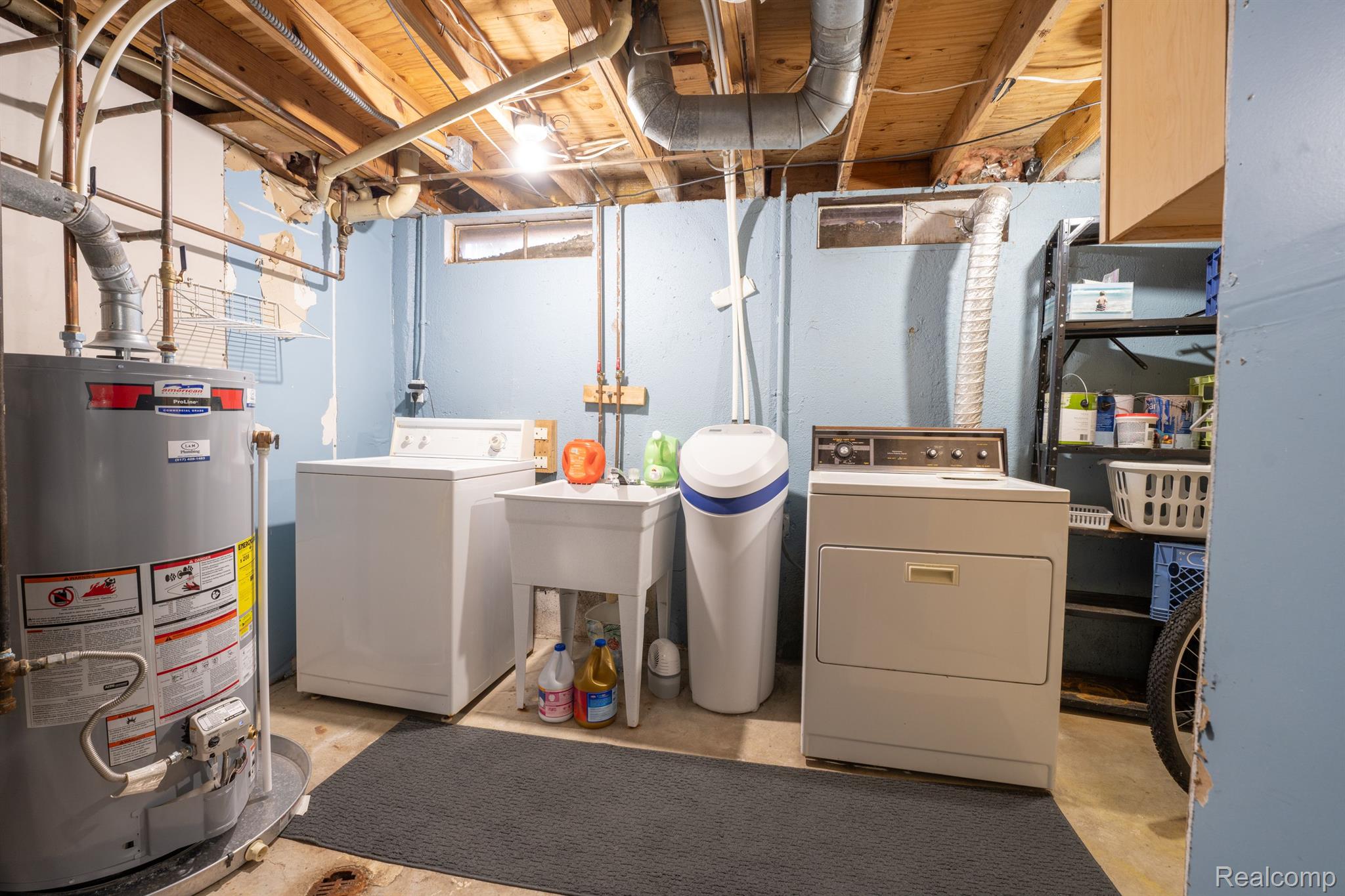 616 Rickett Road, Unit 123 Brighton, MI 48116 - Photo 18 of 21 LAUNDRY ROOM ALSO HAS ROOM FOR STORAGE