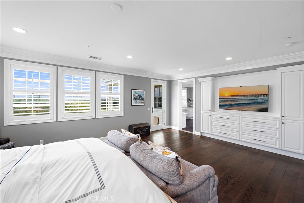 15 Starlight Ladera Ranch, CA 92694 - Photo 13 of 36 a bedroom with a bed and wooden floor