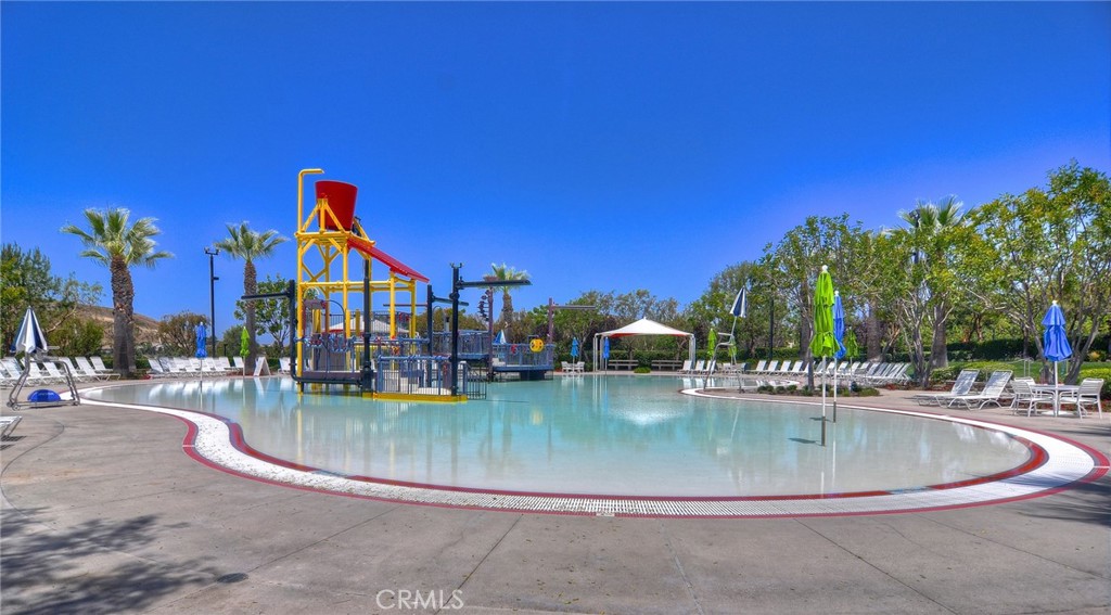15 Starlight Ladera Ranch, CA 92694 - Photo 31 of 36 a view of a swimming pool with outdoor seating