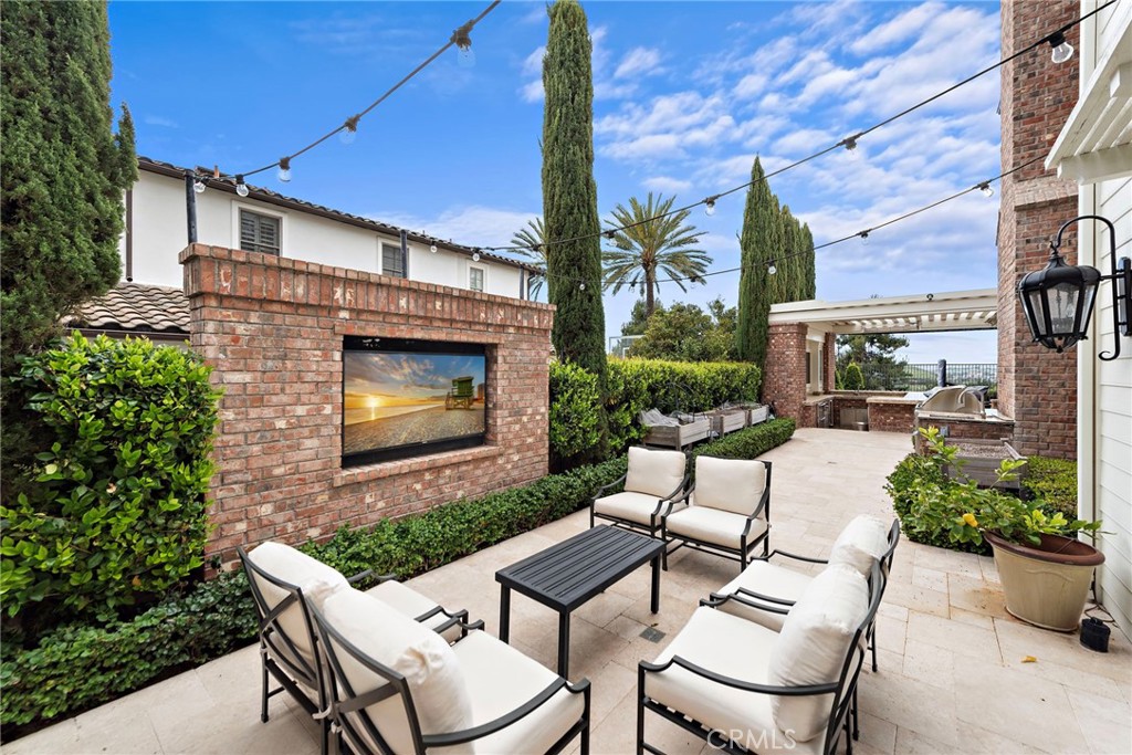 15 Starlight Ladera Ranch, CA 92694 - Photo 5 of 36 a view of a patio with couches table and chairs potted plants