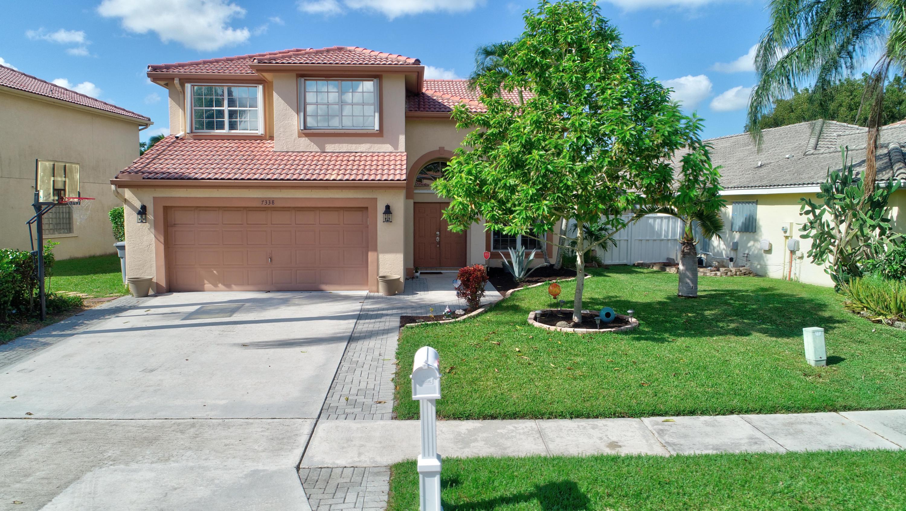 7338 Michigan Isle Road Lake Worth, FL 33467 - Photo 1 of 35 Exterior Front