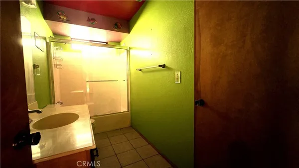 a view of an entryway with a front door