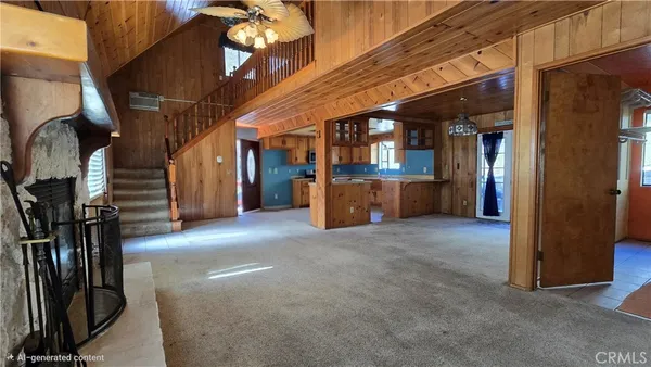 a view of a hallway with stairs