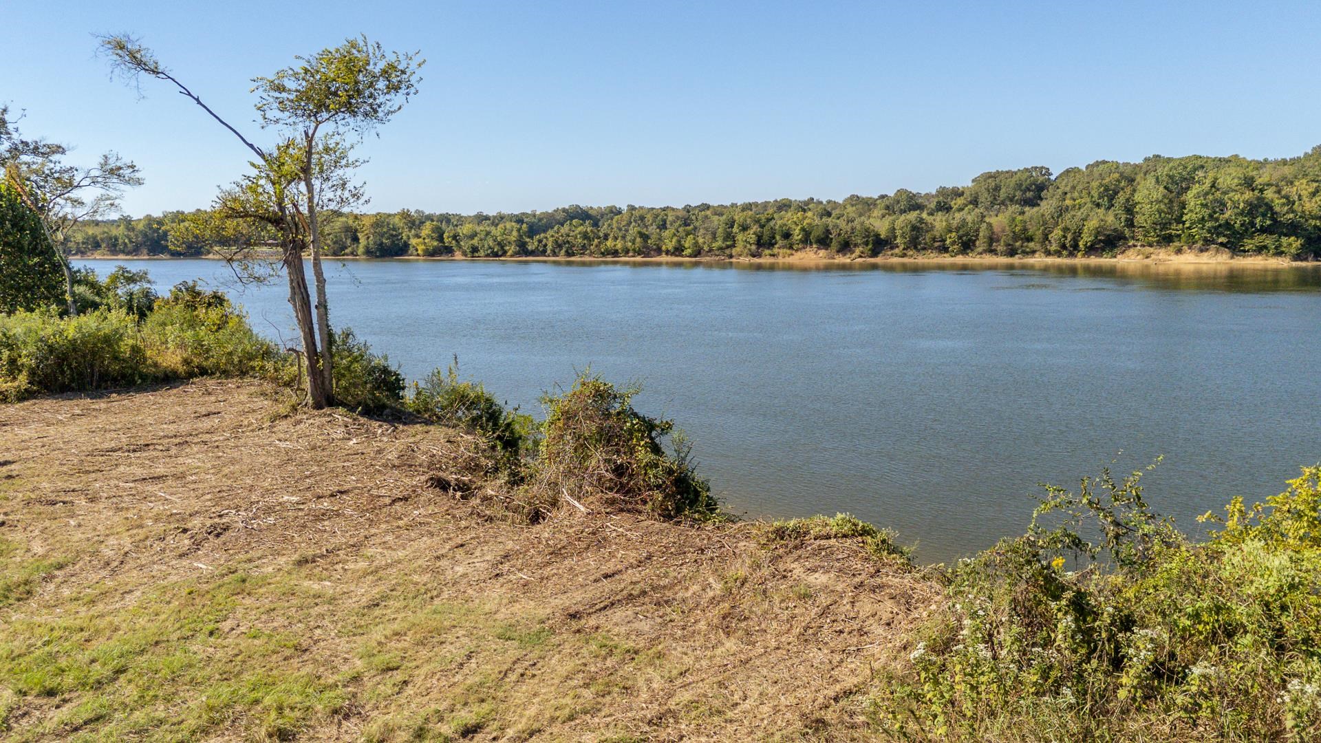 Lot 74 Cravens Road Savannah, TN 38372 - Photo 23 of 39 a view of a lake with a mountain in the background