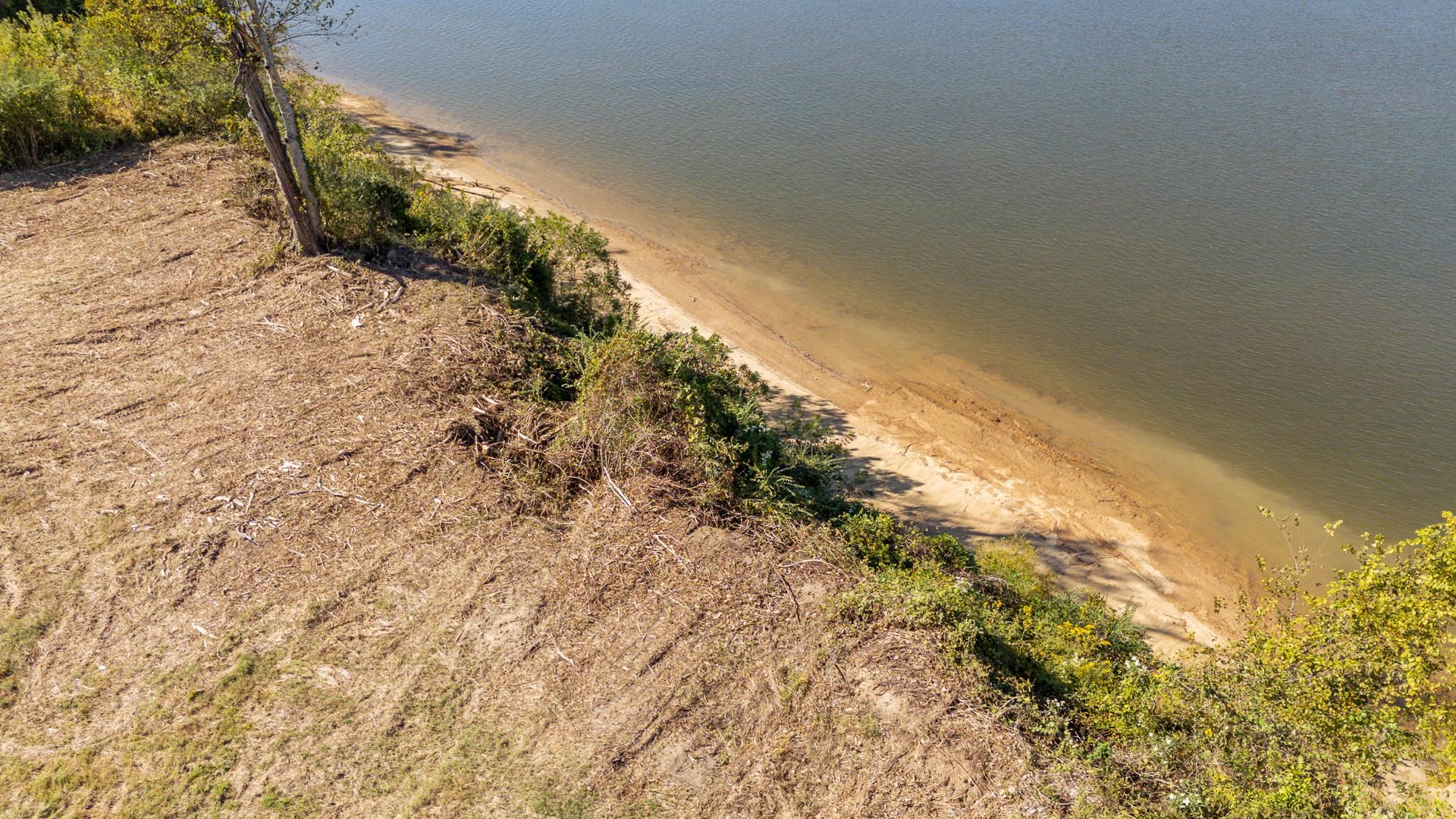Lot 74 Cravens Road Savannah, TN 38372 - Photo 29 of 39 a view of a dry yard with wooden fence
