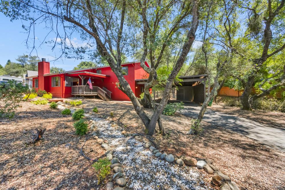 a backyard of a house with lots of green space